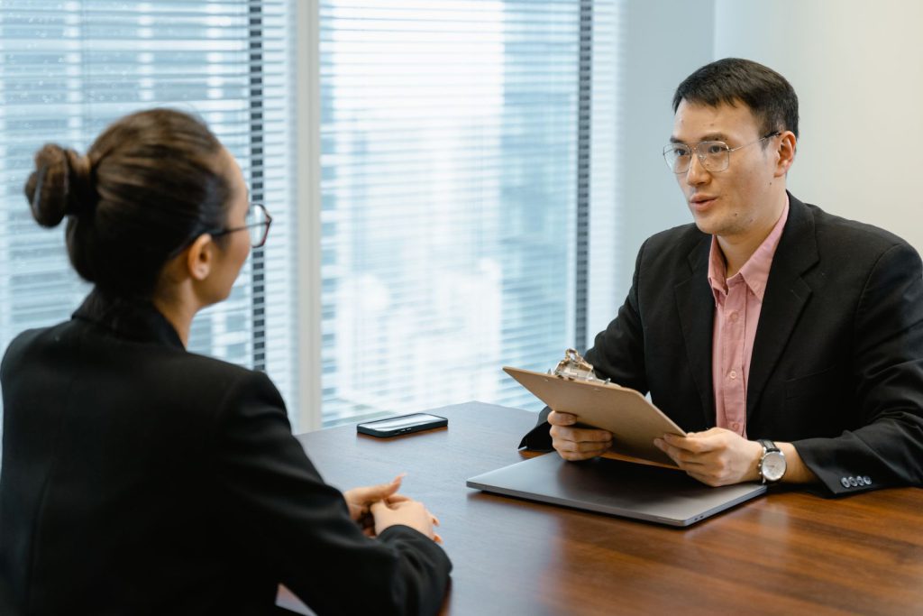 IELTS Speaking Part 3: an examiner asking a candidate follow-up questions